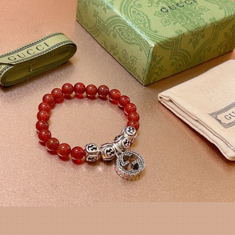 G*u*i bracelets